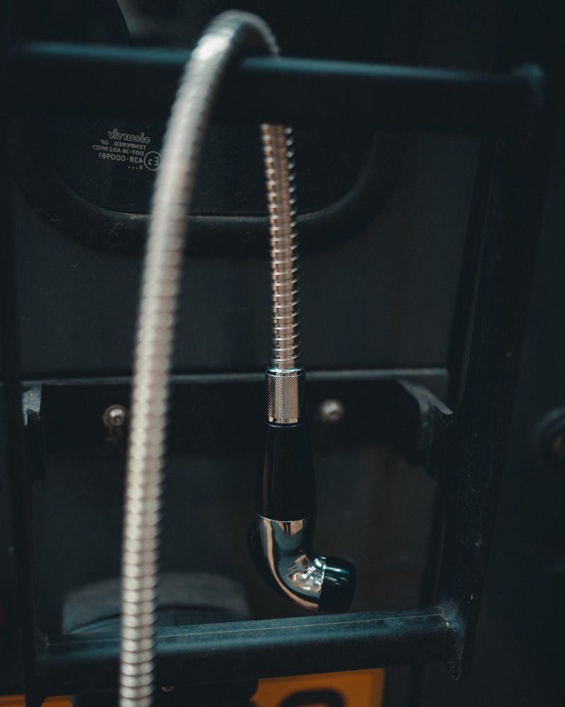 Load image into Gallery viewer, Jerrycan shower hose hanging off the back of a landrover
